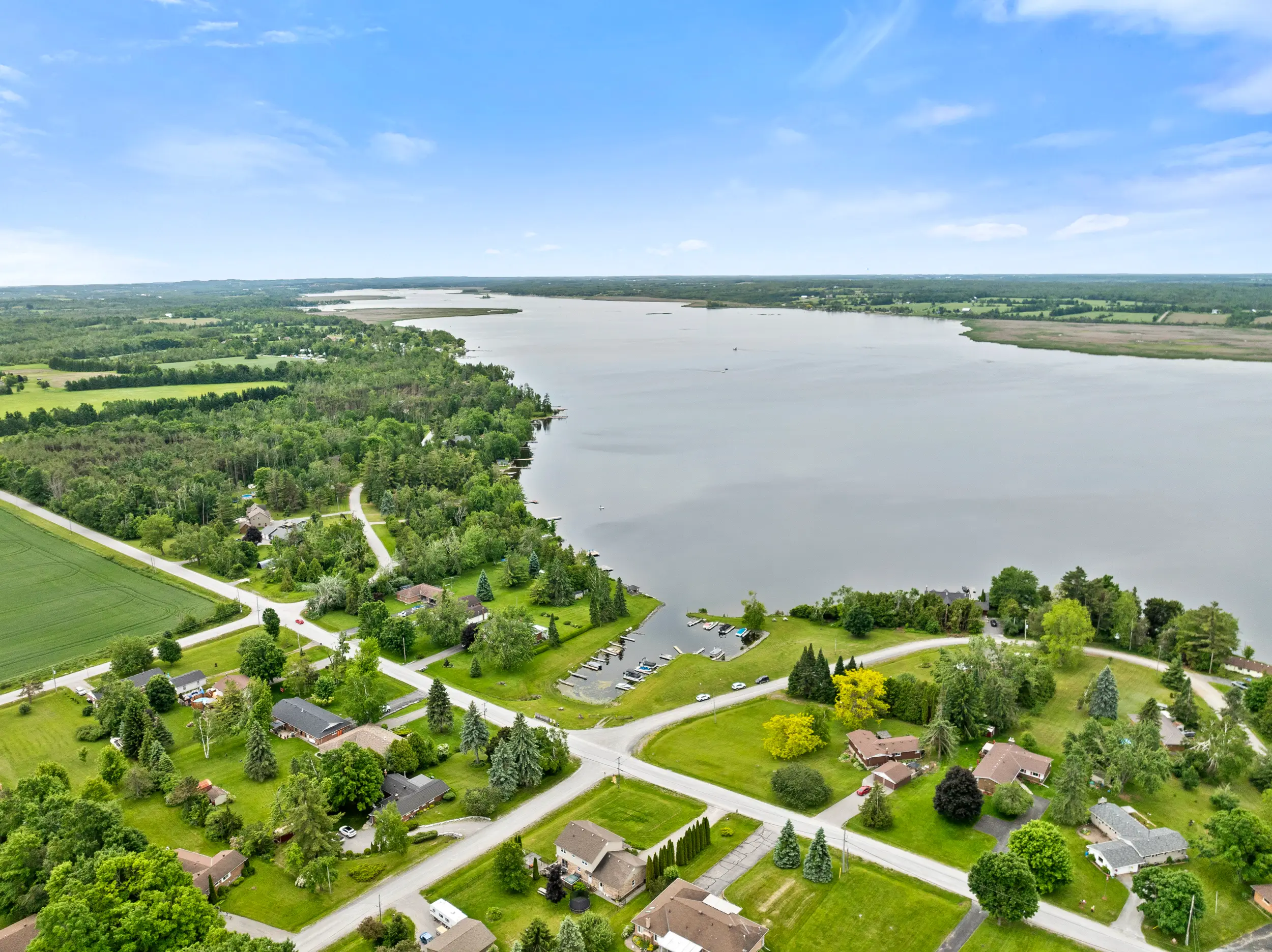 High-quality Real Estate Photography Kawartha showcasing a scenic aerial view of lakefront properties in Ontario.